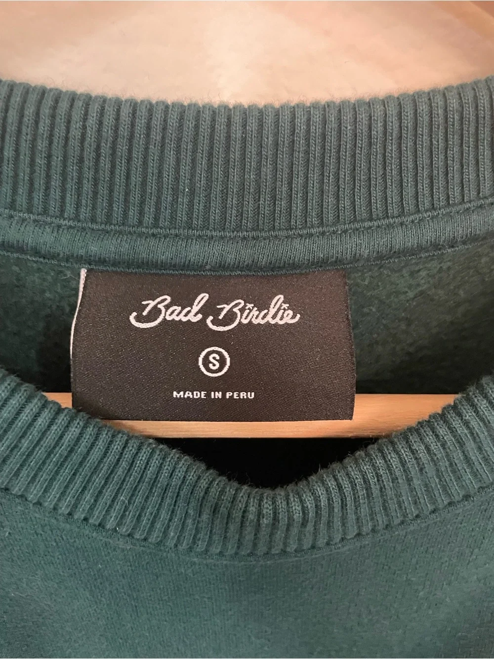 Bad Birdie Dark Green Crewneck with Pink Floral Patch
